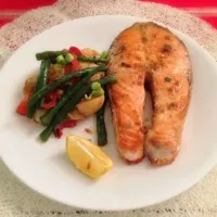 Snapdishの料理写真:Pan fried Tasmanian Salmon  with    Baby potatoes and Asian greens sautéed  with anchovies|Erwinさん