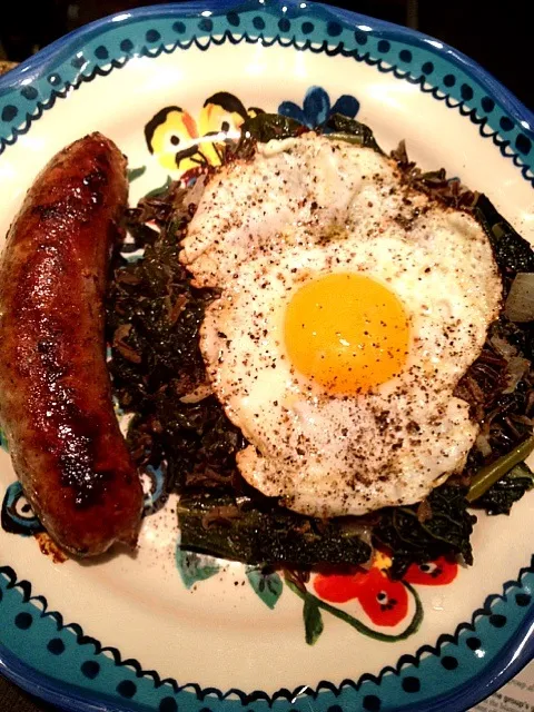 Wild rice with kale, seared Italian sausage, sunny up egg.|Chrisさん