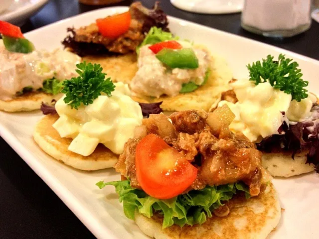 Tuna, sardine & egg mousse on blinis|Nicholas Tayさん