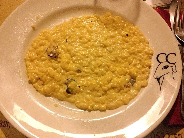 Risotto con crema di parmigiano e tartufo|alessioさん