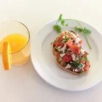 Snapdishの料理写真:Tomato and avocado bruschetta with smoked milk fish|Erwinさん