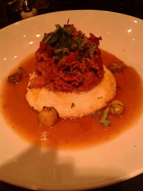 Snapdishの料理写真:braised pork shoulder over sweet corn grits|ryan goldenさん