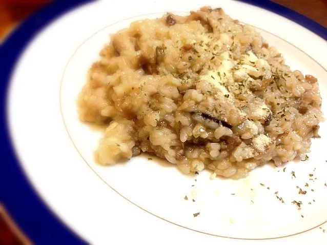 Snapdishの料理写真:朝ごはんリゾット。きのこと牛肉と。|tesasakiさん