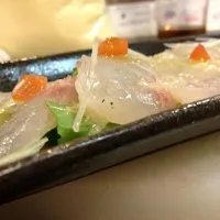 Snapdishの料理写真:真鯛のカルパッチョ|伊酒屋 旋 【めぐる】さん