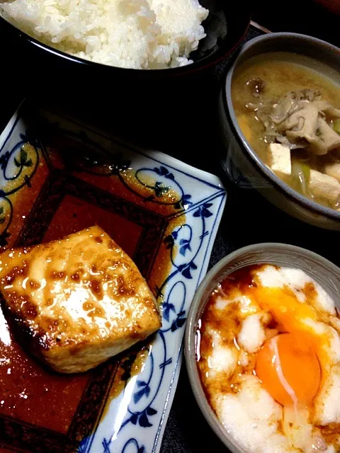 Snapdishの料理写真:#夕飯 エノキ豆腐ネギの鍋ふう味噌汁、白米、黄身入りとろろ、魚(カジキまぐろの生姜照り焼き)。魚の中で1番好きな魚。|ms903さん