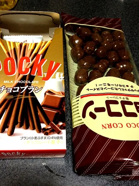 Snapdishの料理写真:#夜おやつ  チョココーンとポッキーチョコブラン。こども店で売ってそうなもんと大人味の融合。|ms903さん