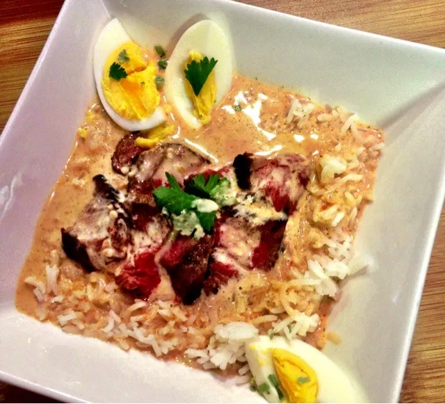 Succulent Fillet served with a red curry, coconut and peanut sauce, with salted eggs and jasmine rice|Lemar Olivierさん