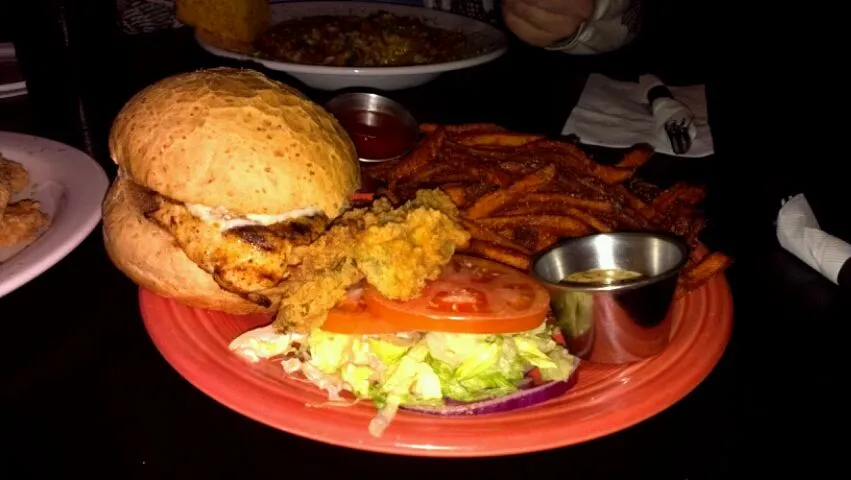 voodoo spicy chicken sandwich with fried pickles, pepperjack cheese, tomatos, and lettuce. oh and voodoo sauce of course.|Taylor salyersさん