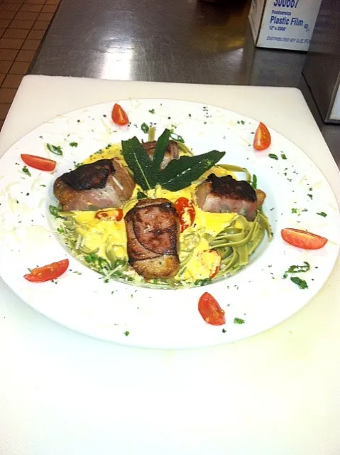 Prosciutto wrapped Veal saltimbocca over spinach fettuccini with roasted tomato and sage cream sauce|j t yawgerさん