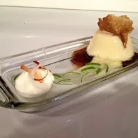 Rum custard and Coca-cola reduction "flan", Coca-cola tuile, lime curd with julienne lime zest, coconut creme chantilly with toasted coconut.|Jorge Cazaresさん