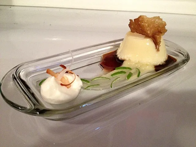 Rum custard and Coca-cola reduction "flan", Coca-cola tuile, lime curd with julienne lime zest, coconut creme chantilly with toasted coconut.|Jorge Cazaresさん