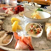 Poco platter. Oysters, shrimp, king crab, 3 styles of ceviche.|Jason Neffさん