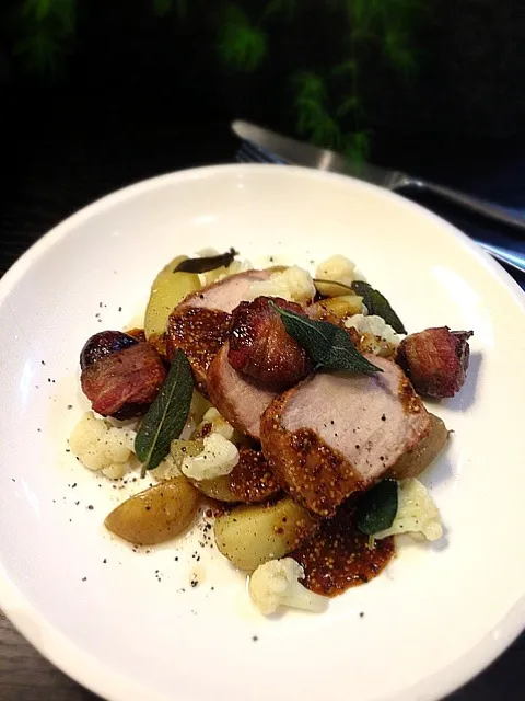 Snapdishの料理写真:Pork fillet,bacon roll with dried fig,pickled cauliflower,crispy sage,mustard sauce.|rick chanさん