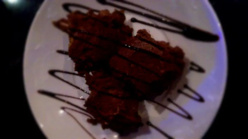 profiterrole covered in choc ice cream and choc syrup|harry masonさん