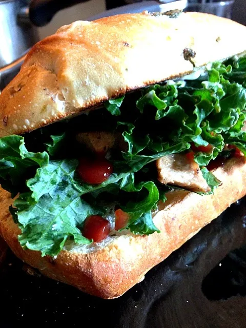 Snapdishの料理写真:BBQ veggie seitan sandwich with kale, on organic olive bread|georgianaさん