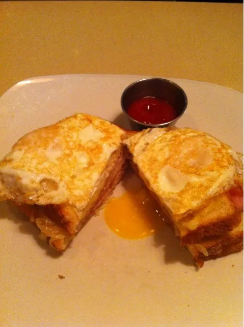 Croquet madam, ham, cheese with fried egg on top|sandy luuさん