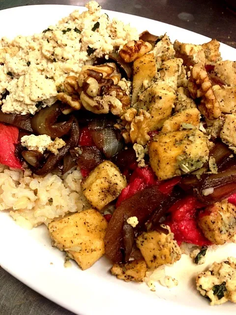 Snapdishの料理写真:Brown rice with rhubarb, caramelized onion, tofu-basil mash and roasted spiced tofu and walnuts.|georgianaさん