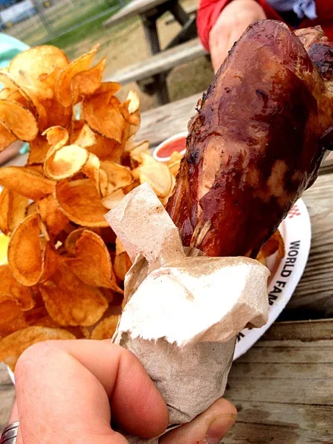 Turkey leg and fried potatoes at the rodeo.|andrew franciscoさん