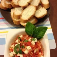 Snapdishの料理写真:Bruschetta with tomato & mozzarella|Nopparat Cさん