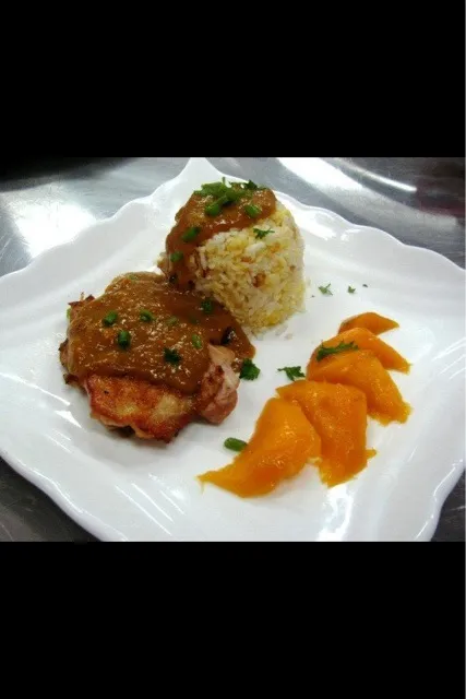 Chicken with orage and peach sauce on top|lorreignさん