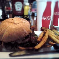 bacon and cheese burger with french fries and coca cola.|Marshall Chanさん