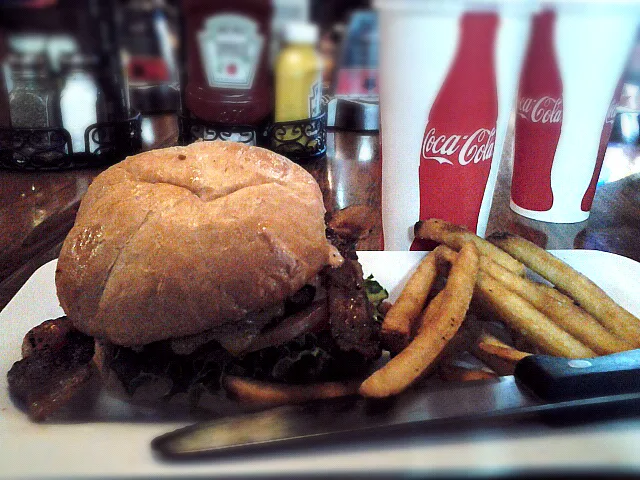 bacon and cheese burger with french fries and coca cola.|Marshall Chanさん