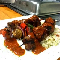 Snapdishの料理写真:Lamb & vegetable kebab over basmati rice with a morrocan sauce|j t yawgerさん