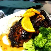 Snapdishの料理写真:Roasted duck caramelized with a sweet and spicy orange sesame glaze.....|j t yawgerさん