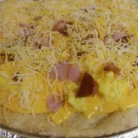 Snapdishの料理写真:bacon ham egg n cheese breakfast pizza|laura risolaさん