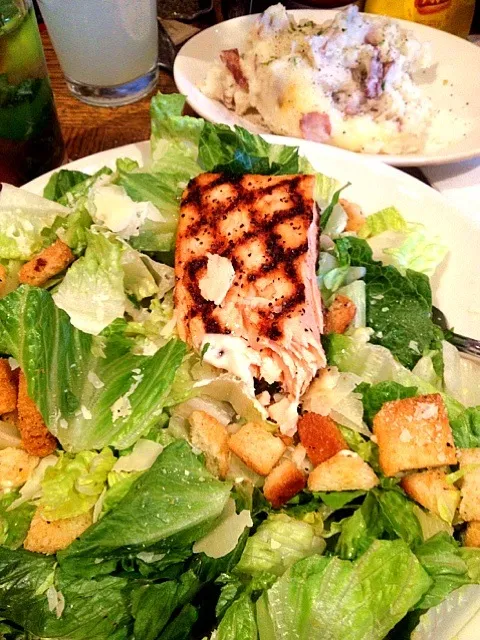 Grilled Salmon caesar salad with white cheddar mashed potatoes.|amyさん