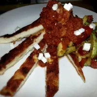 Snapdishの料理写真:Breaded chicken strips with Mediterranean sauté and a slowly cooked pomodoro and mushrooms sauce. Decorated with cheese (queso fresco)