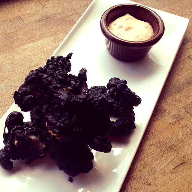 Snapdishの料理写真:Black Ink coated Calamari el Bulli w spicy aioli|Carin Tayさん