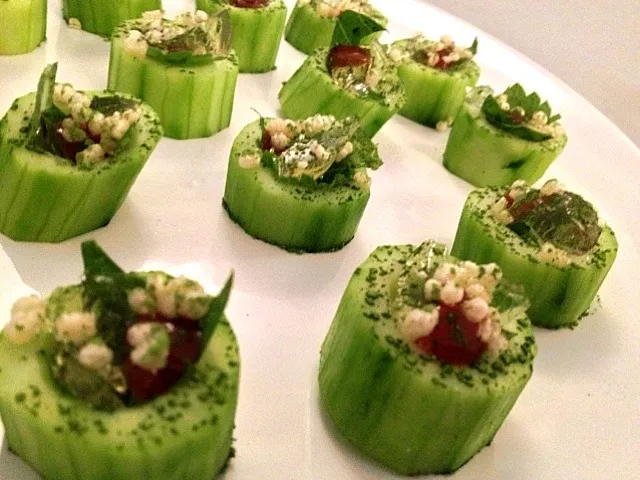 Cucumber cup w/ tomato water gelee, umeboshi, shiso, puffed rice, & matcha|andrew franciscoさん