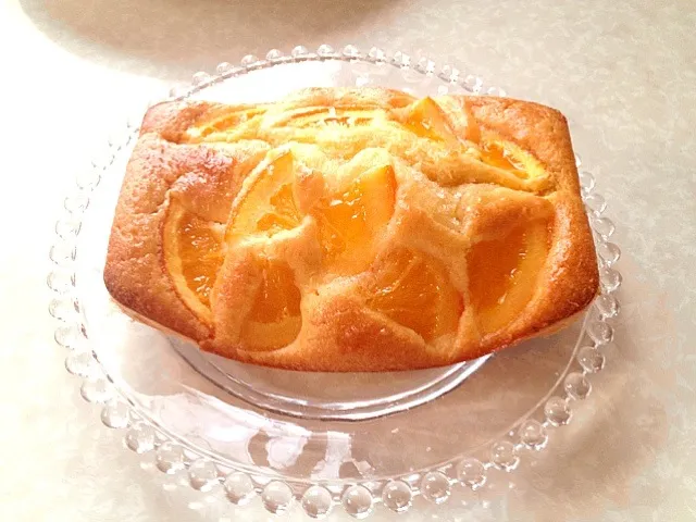 Snapdishの料理写真:stavaさんのはちみつケーキオレンジコンフィ乗せ🍊|みきぴょん♪さん