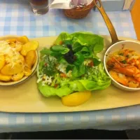 Shrimp in garlic oil, with potatoes and salad|xenia kadarさん