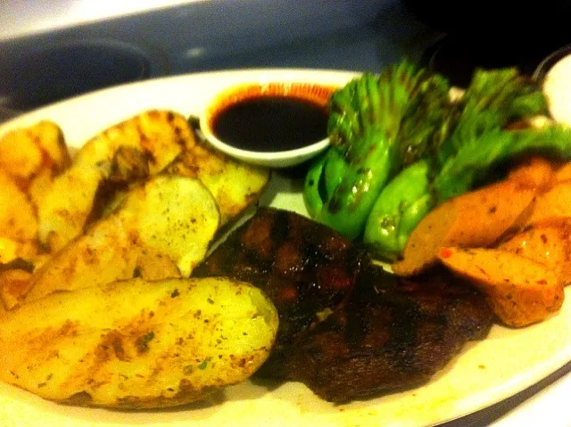 Grilled plate. Yukon potatoes, bok choy, steak, and chicken cipotle sausage|virginia frasseさん