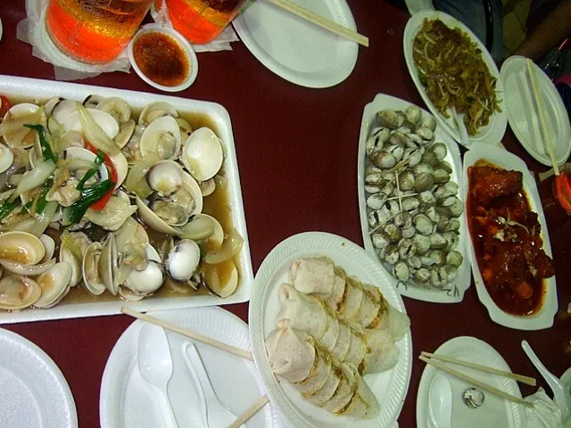 Snapdishの料理写真:Stir-fried Clams, Popiah, Cockles, Tulang & Char Kway Teow|Yvonne Limさん