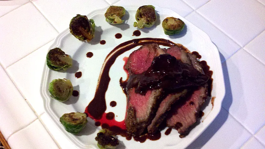 Snapdishの料理写真:tri-tip with mushrooms and onions sauteed in bacon fat and cooked in red wine and goat cheese and brussel sprouts sautéed in bacon fat|Daniel Cordovaさん