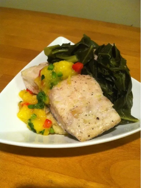 Mahi with mango salsa and a side of braised greens|Mark Nataliさん