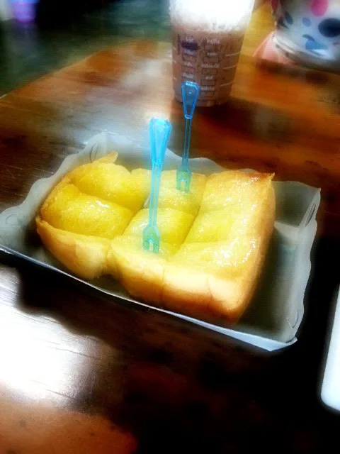 Snapdishの料理写真:Grill toast with butter, sugar and sweeten condense milk|Tomさん