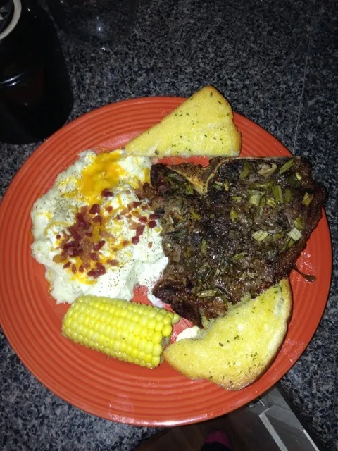 TBone steak, loaded mash, corn on the Cobb .., and garlic bread ...|nickey featherさん