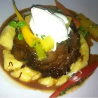 Braised short ribs on mashed potatoes with glazed root veggies  and horse radish sour cream from Hawks!|paul thompsonさん