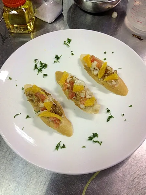 Spanish cuisine- Cod fish with caramelised leek and orange, on baguette|Angie Yapさん