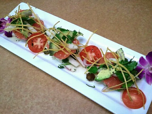 Snapdishの料理写真:Jicama salad with grapefruit tomatoes avocados and drizzled with jalapeno juice|Jacki Carterさん