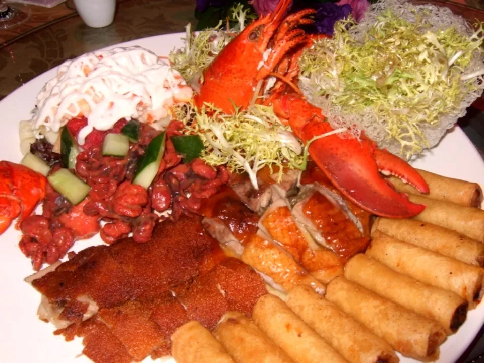 Snapdishの料理写真:Cold Platter - Lobster, Roast Duck, Baby Octopus, Roast Piglet & Spring Roll|Yvonne Limさん