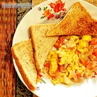 Snapdishの料理写真:Scrambled eggs in tomatoes and onions|Rizza Javierさん