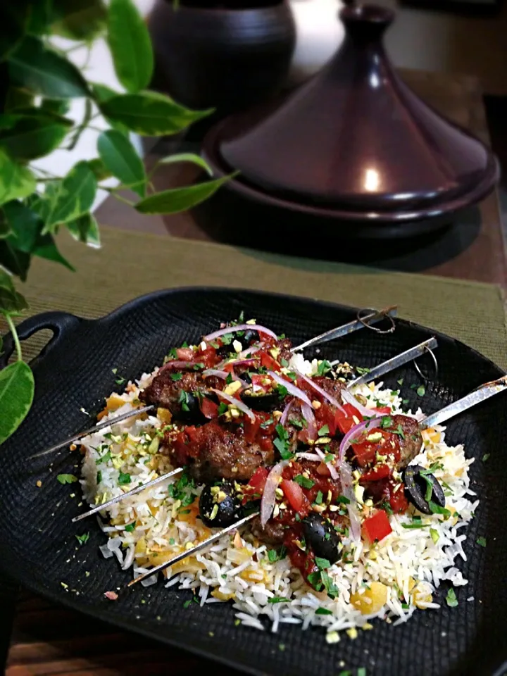 Lamb kefta,tomato charmoula sauce,pistachio,apricot and star anise pilaf|rick chanさん