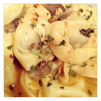 Snapdishの料理写真:Mushroom tortelloni with brown butter+raw honey+chili paste sauce.|Jenn Bussellさん