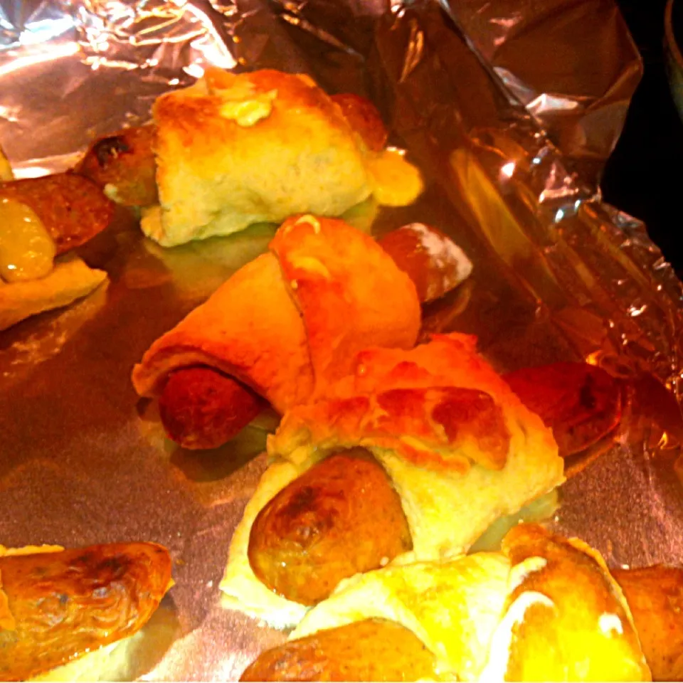 Snapdishの料理写真:Chicken and mango sausages wrapped in biscuit dough|virginia frasseさん