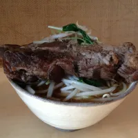 Snapdishの料理写真:軟骨ソーキ一本乗せラーメン|かだらにたさん